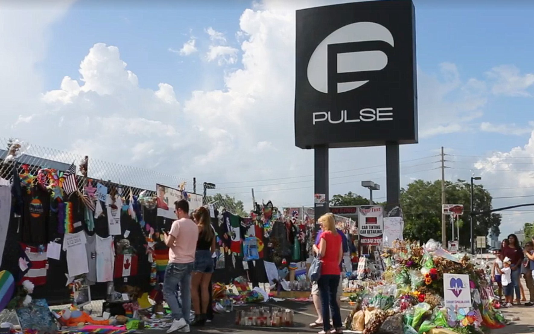 People travel to Pulse nightclub to honor the victims of the massacre